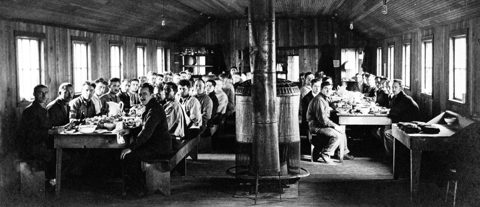 Men gathered for Thanksgiving in 1919 in the Conscientious Objector Prison Camp dining hall at Fort Douglas, Utah.  Photo courtesy of Swarthmore College Peace Collection.